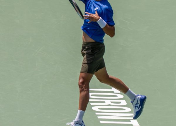 Musetti's Airborne Forehand by Bruce Reid – Award of Merit